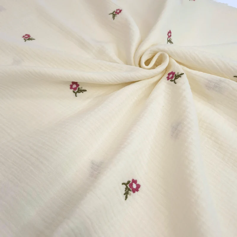 Mussola di Cotone Doppia Garza H 140 cm - FIORELLINI ROSA SCURO RICAMATI/LATTE