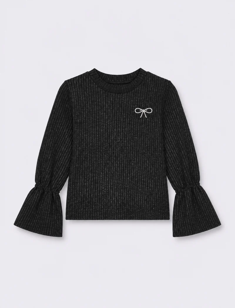 Pullover da bambina con spilla gioiello. - Nero