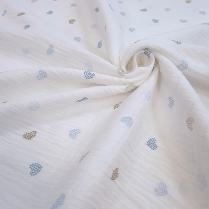 Mussola di Cotone Doppia Garza H 140 cm - CUORICINI AZZURRI E TORTORA/LATTE
