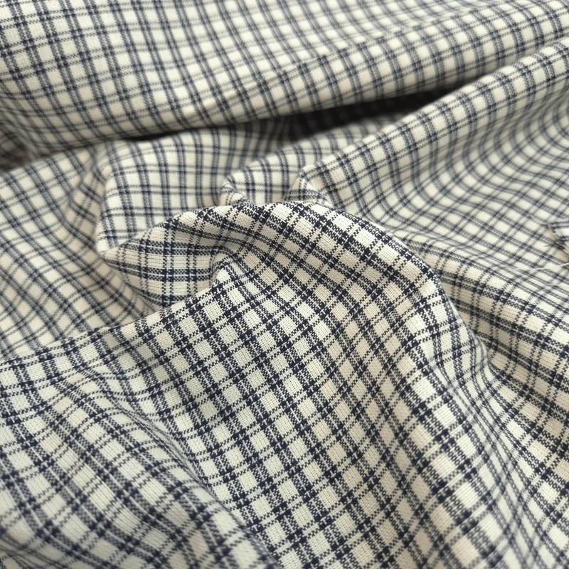Tessuto Cotone H 110 cm - INTRECCIO DI QUADRETTI