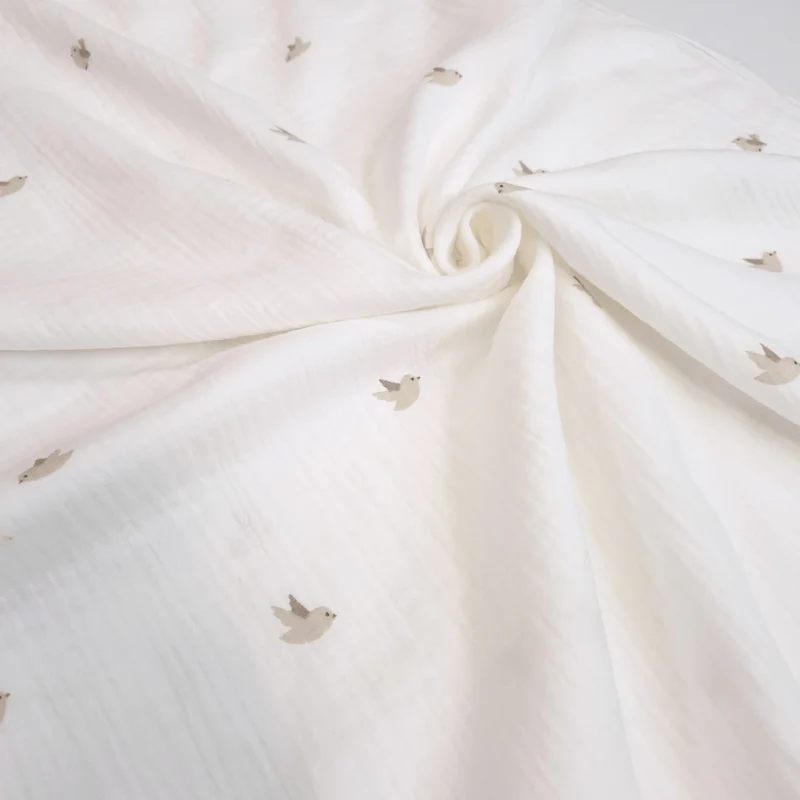 Mussola di Cotone Doppia Garza H 140 cm - UCCELLINI/LATTE