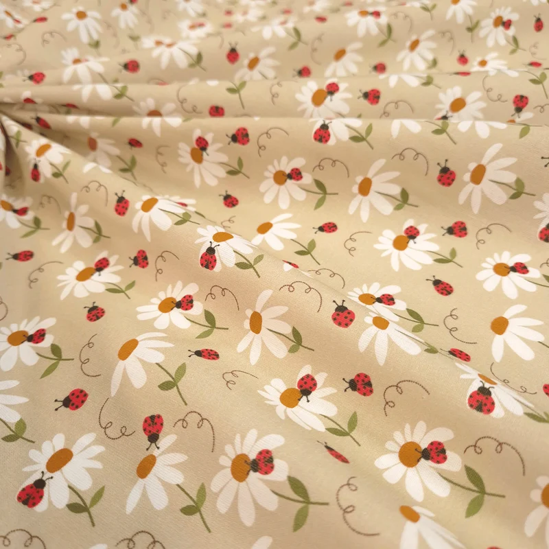 Tessuto Cotone H 150 cm - MARGHERITE E COCCINELLE