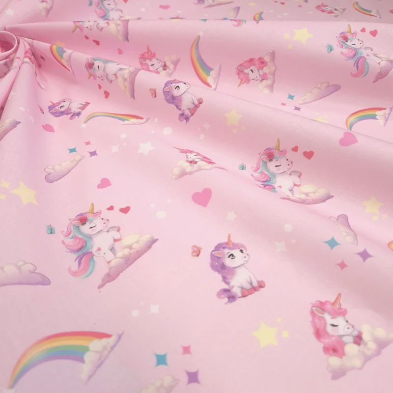 Tessuto Cotone H 140 cm - UNICORNI