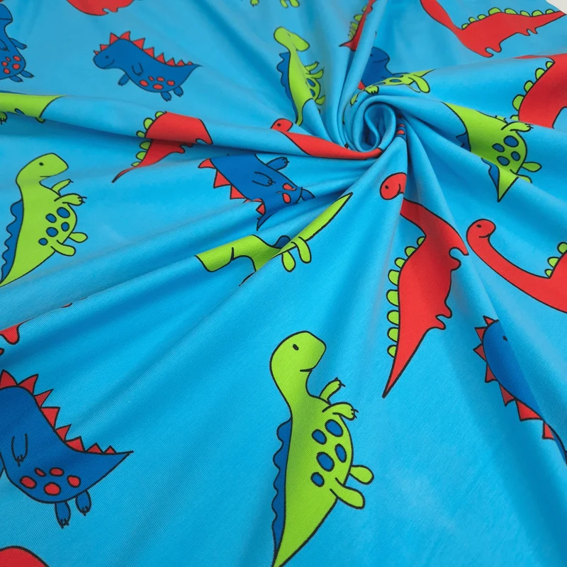 Jersey di Cotone H 150 cm - DINOSAURI/AZZURRO