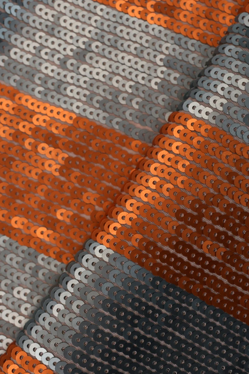 Tessuto in paillettes bicolore