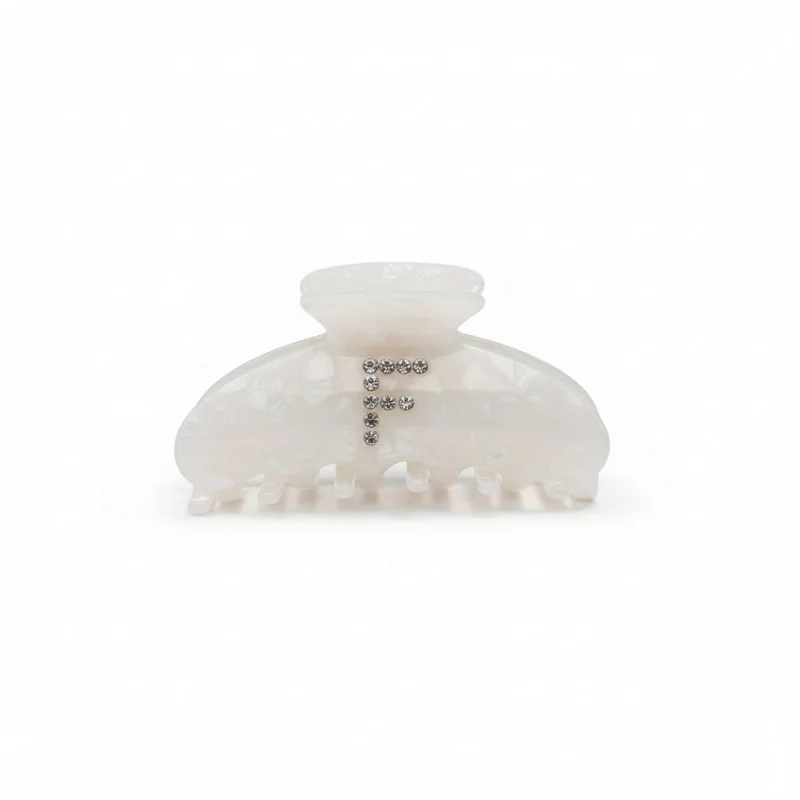 Pinza con lettera in strass scintillanti - var 3