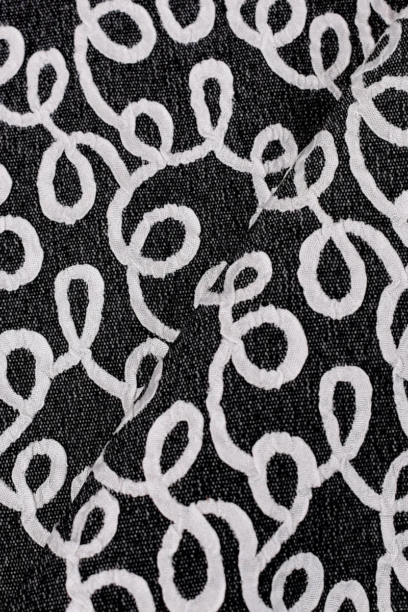 Jacquard sintetico fantasia geometrica