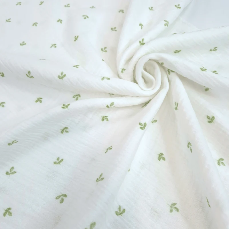 Mussola di Cotone Doppia Garza H 140 cm - FOGLIOLINE VERDI/LATTE