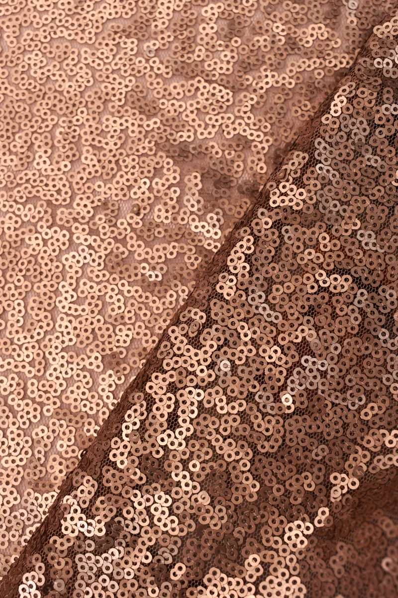 Tessuto in paillette oro