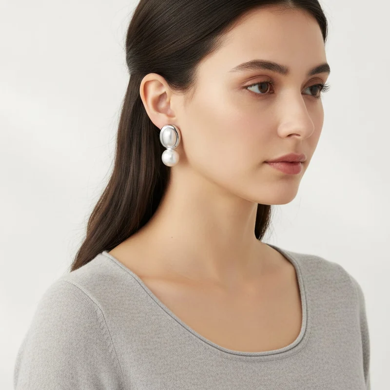 Orecchini a bottone con eleganti perle - Argento