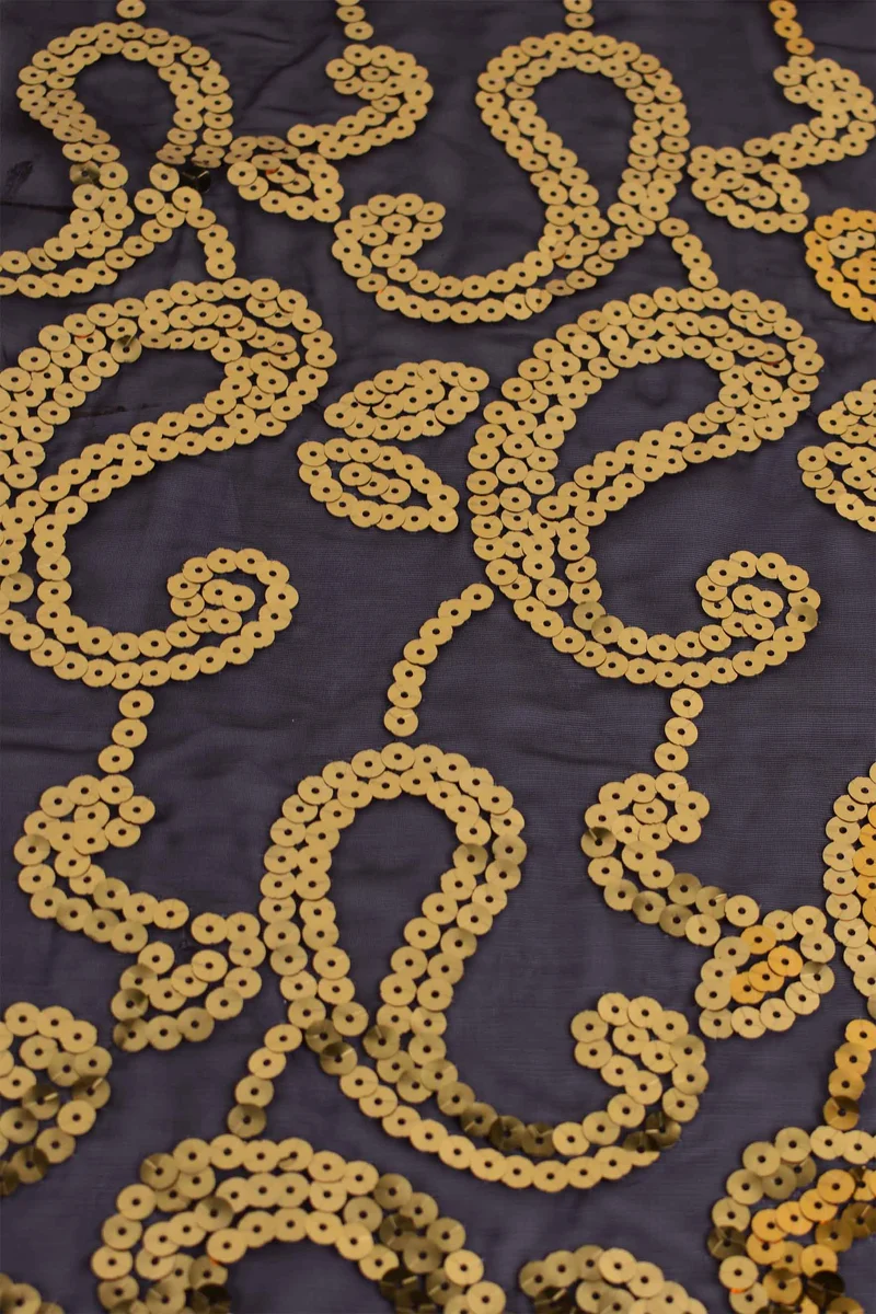 Tessuto paillettes ricamato