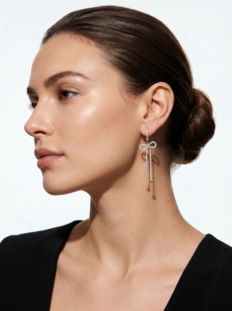 Orecchini cerchio con fiocco e strass - Argento