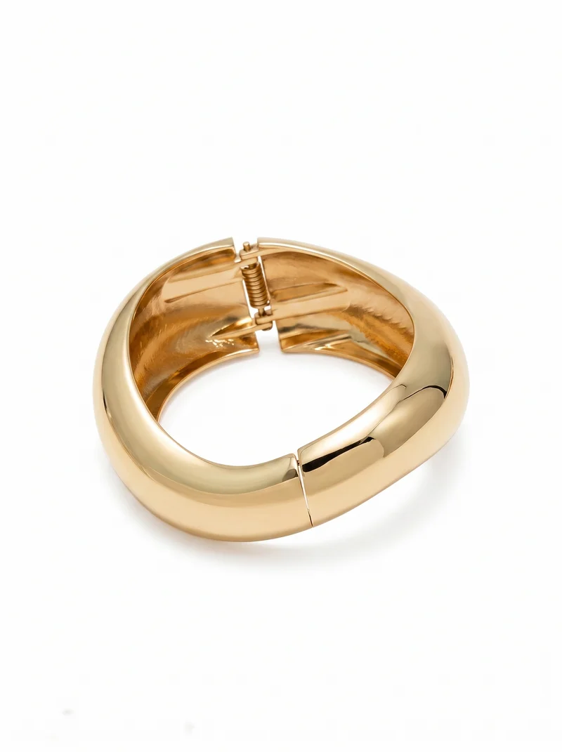 Bracciale rigido bombato a onda - Oro