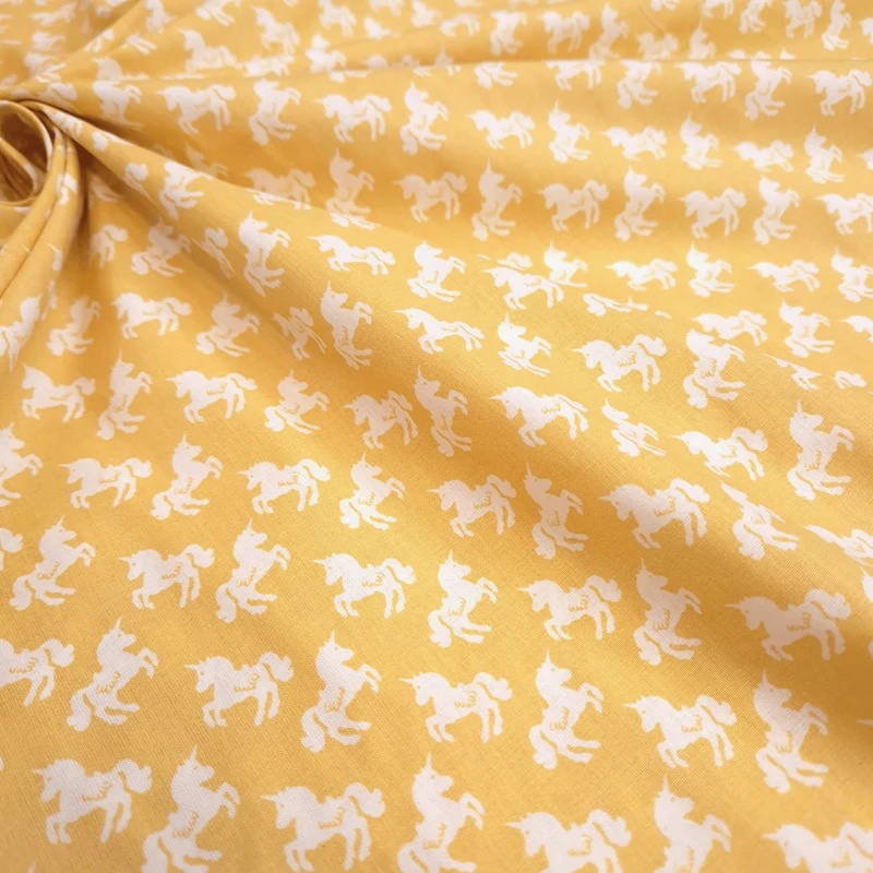 Cotone Percallino H 290 cm - UNICORNI BIANCHI/GIALLO