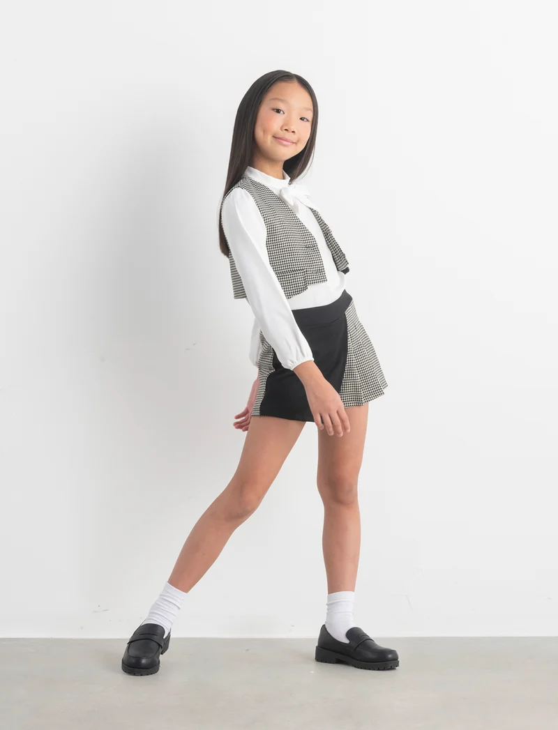 Short in pied de poule con pannello a contrasto. - Fantasia