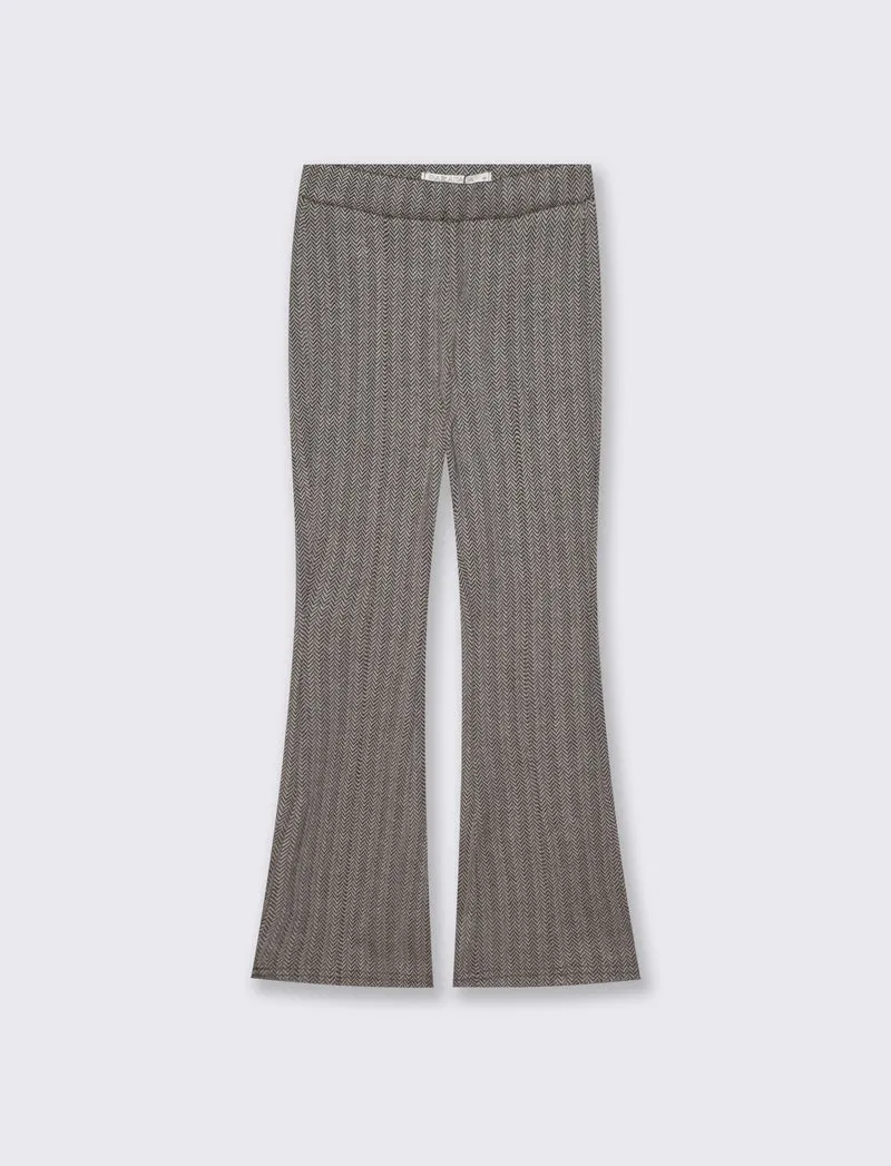 Pantaloni flare in tessuto spigato elastico - Beige