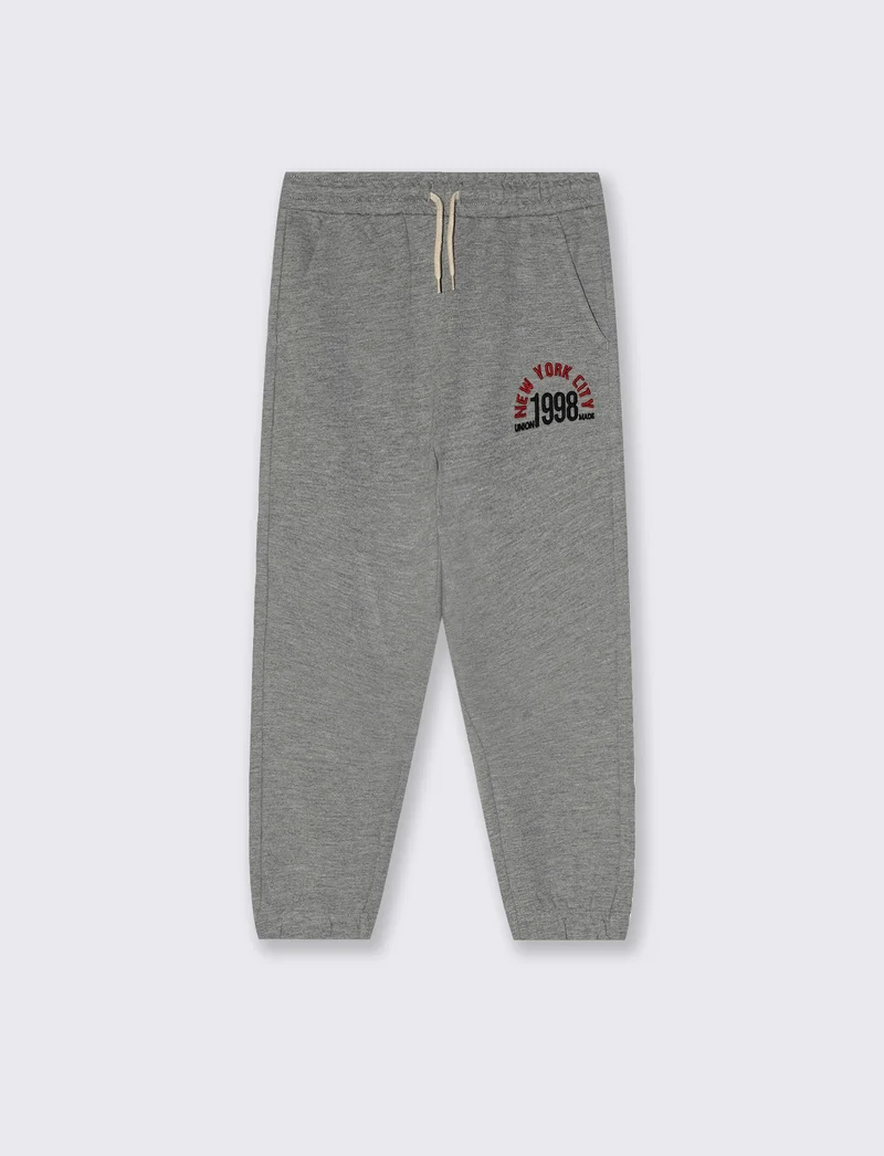 Jogger in felpa con stampa college - Grigio chiaro mel.