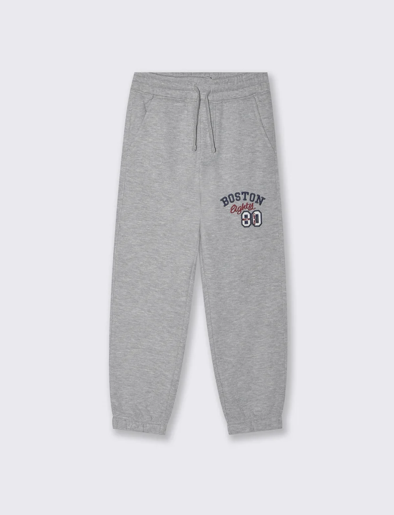 Jogger con ricamo e coulisse in vita - Grigio mel.