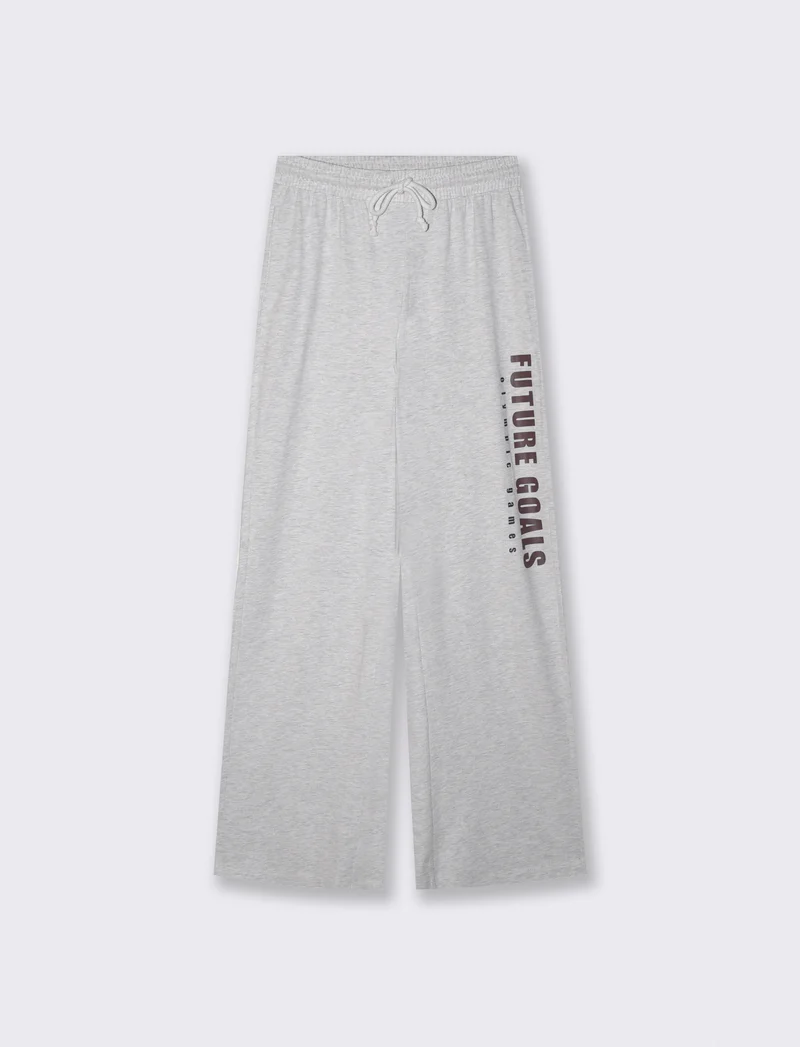 Pantaloni tuta dritti con coulisse e stampa - Grigio mel.