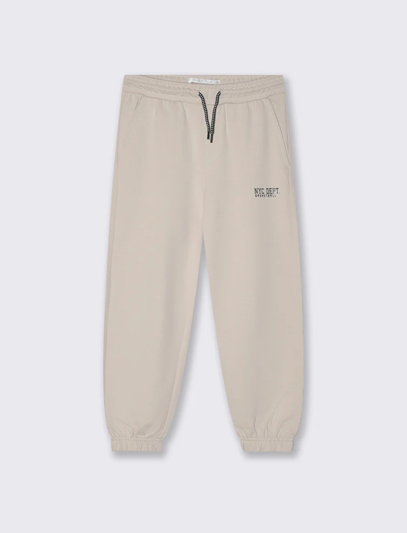 Jogger in felpa con coulisse e patch - Beige