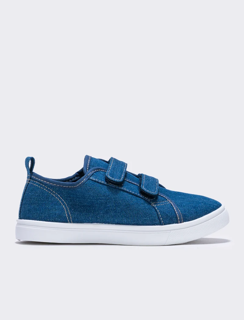 Scarpa in tela da bambino con strappi - Denim