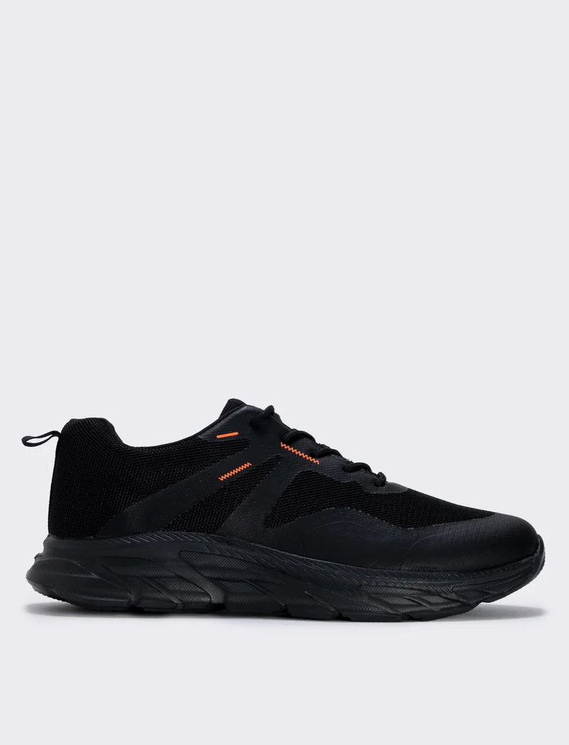 Scarpa sportiva nera in tessuto tecnico - Nero