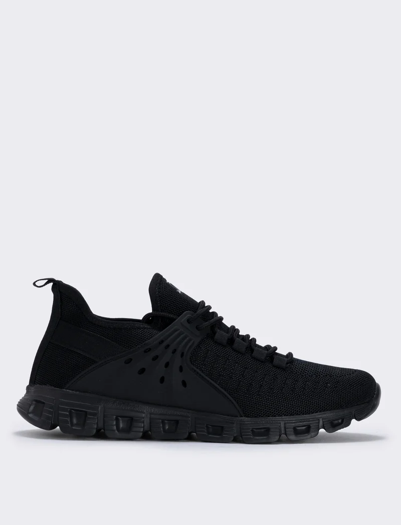Sneakers running uomo in tessuto tecnico - Nero