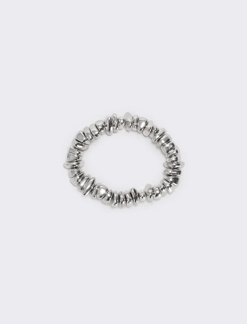 Bracciale elastico con pepite asimmetriche - Argento