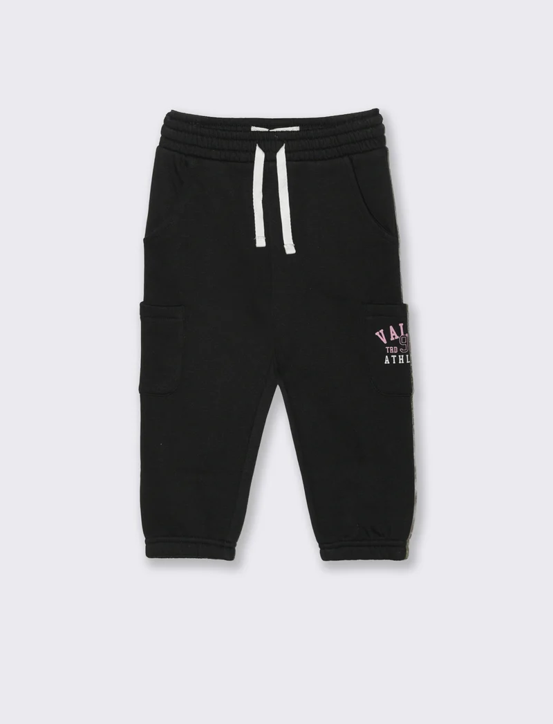 Jogger ampi con tasche e coulisse - Nero