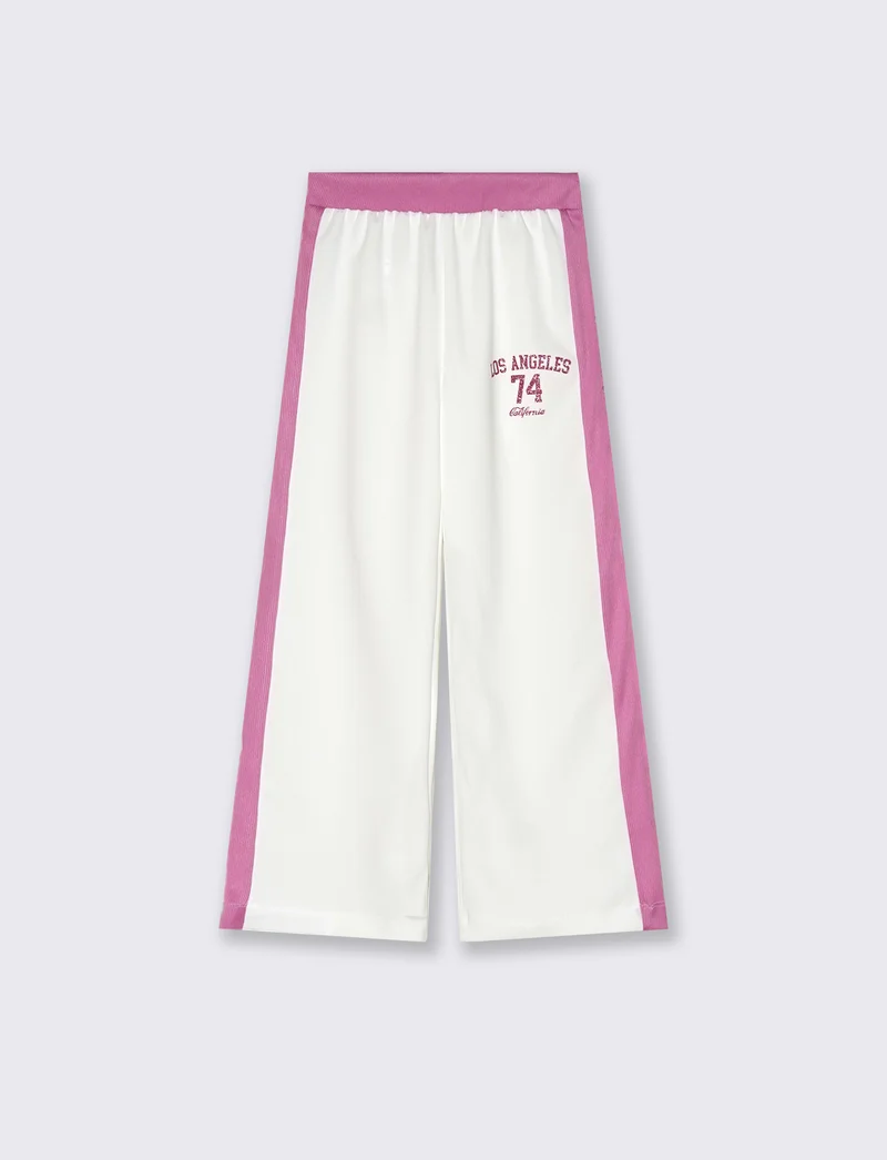 Jogger da bambina con costina a contrasto. - Bianco