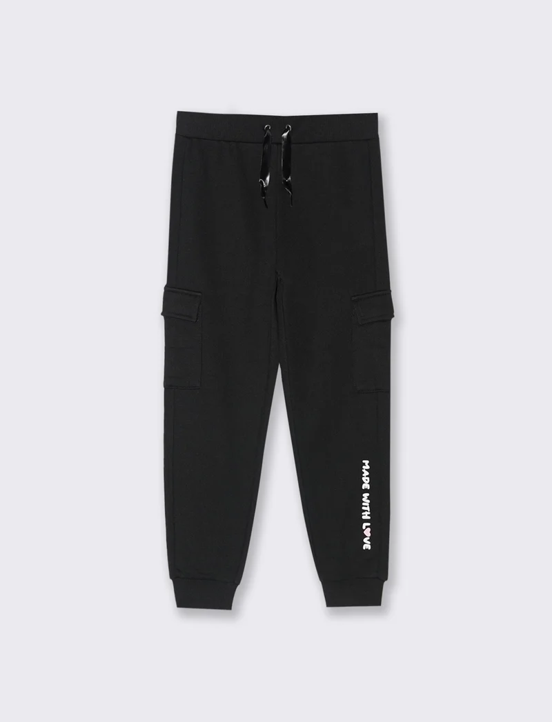Pantaloni in felpa con tasconi. - Nero