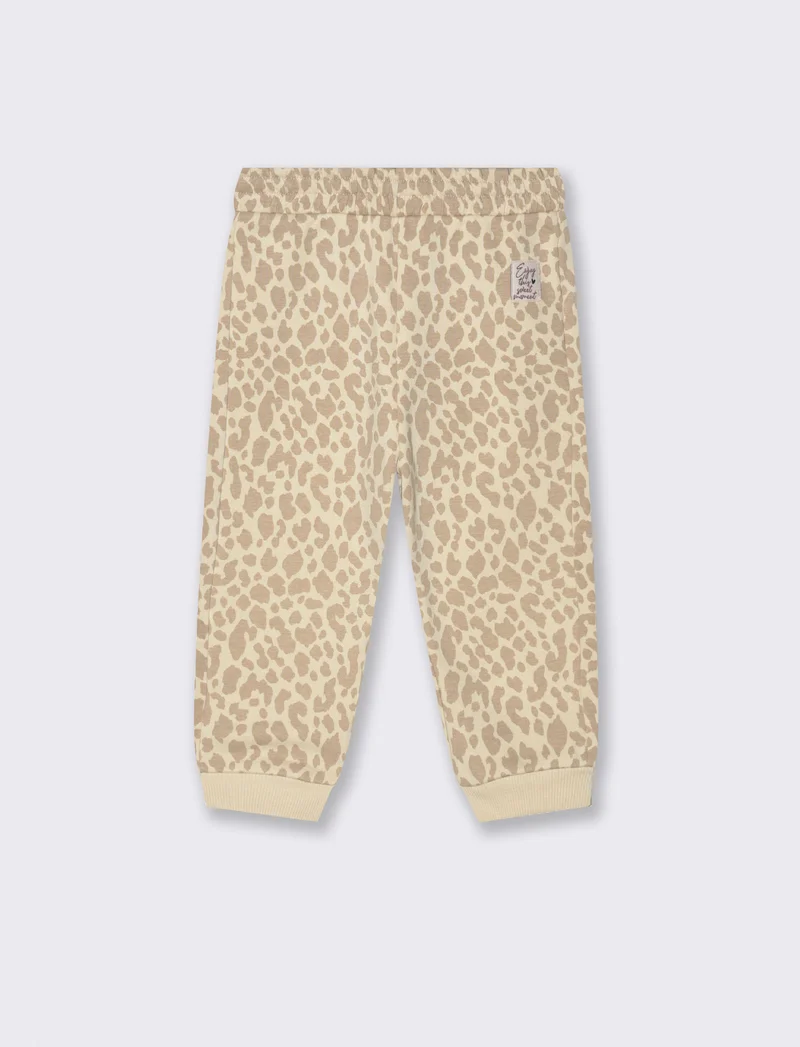 Jogger con stampa all over - Beige