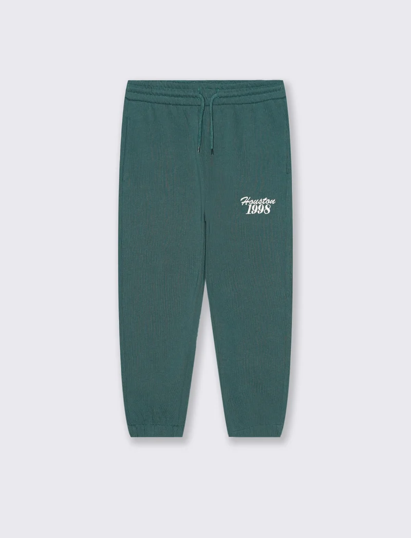 Jogger con ricamo college. - Verde