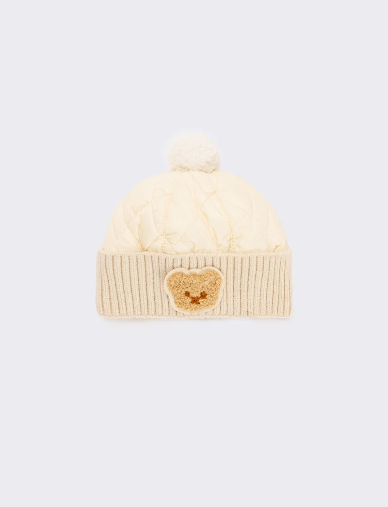 Cappello neonato con pon pon trapuntato - Bianco panna