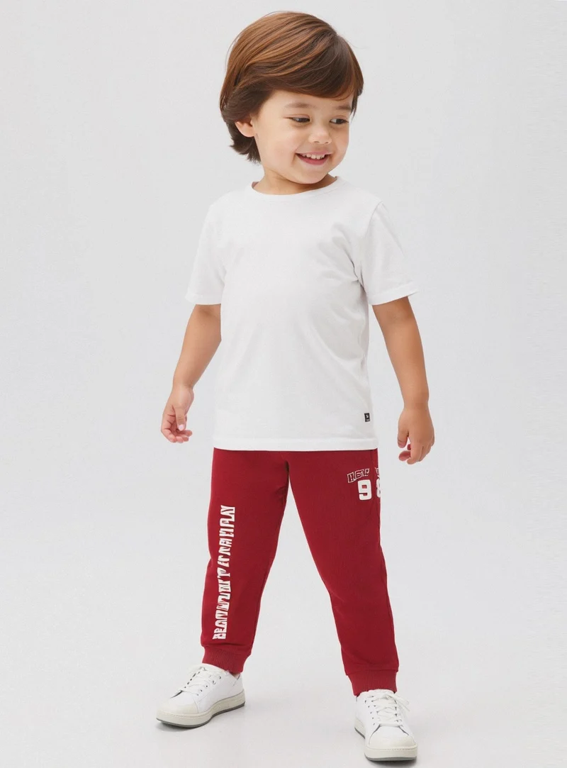 Jogger con baschina a righe - Bordeaux