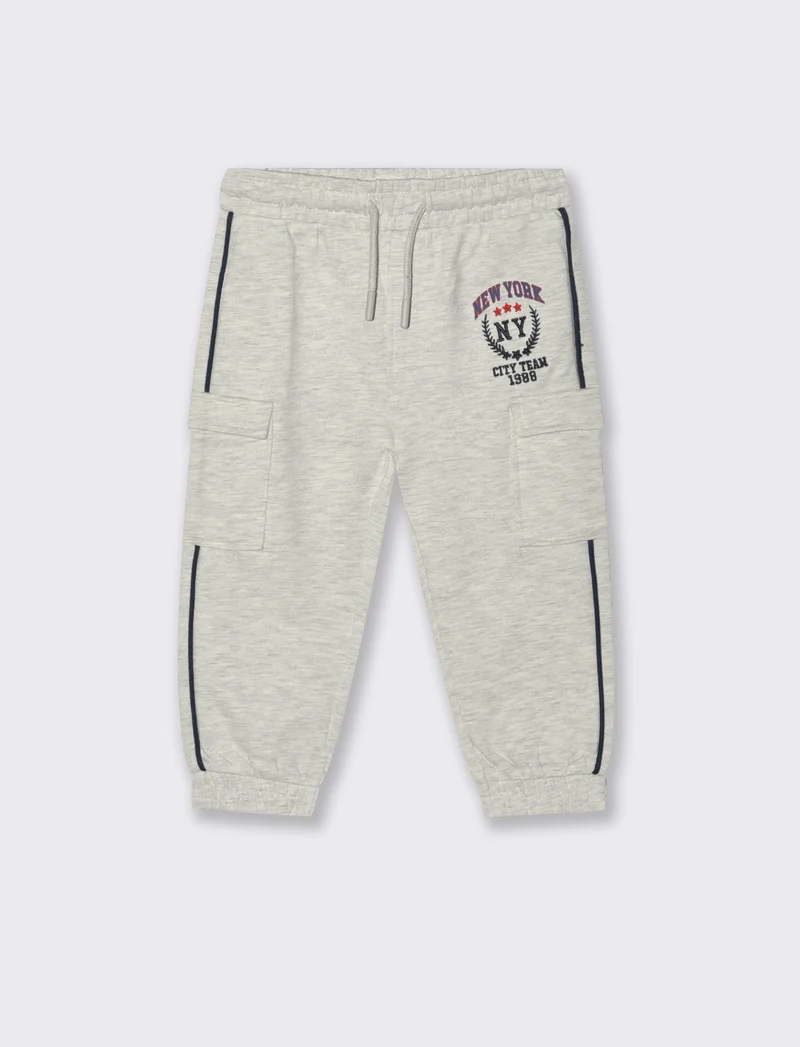 Jogger con tasche e piping - Grigio mel.