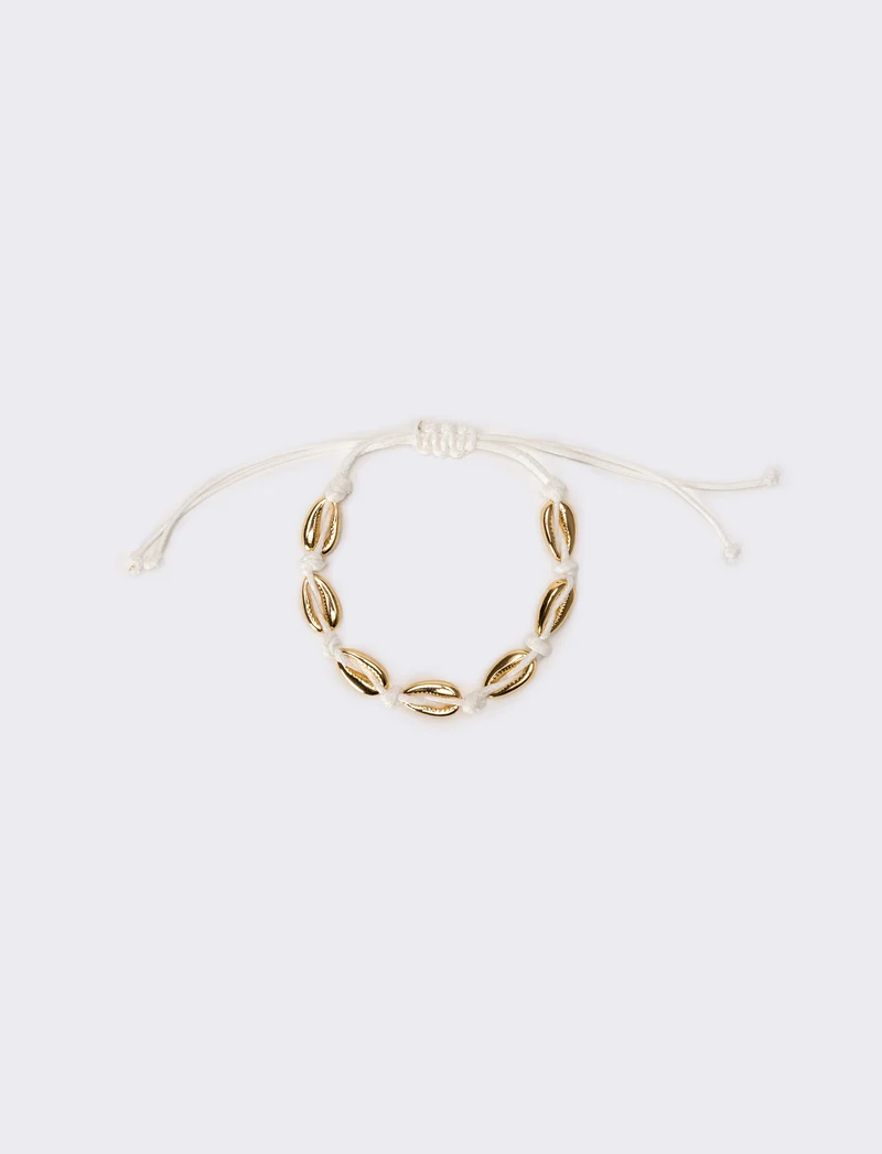 Cavigliera donna con conchiglia - Oro