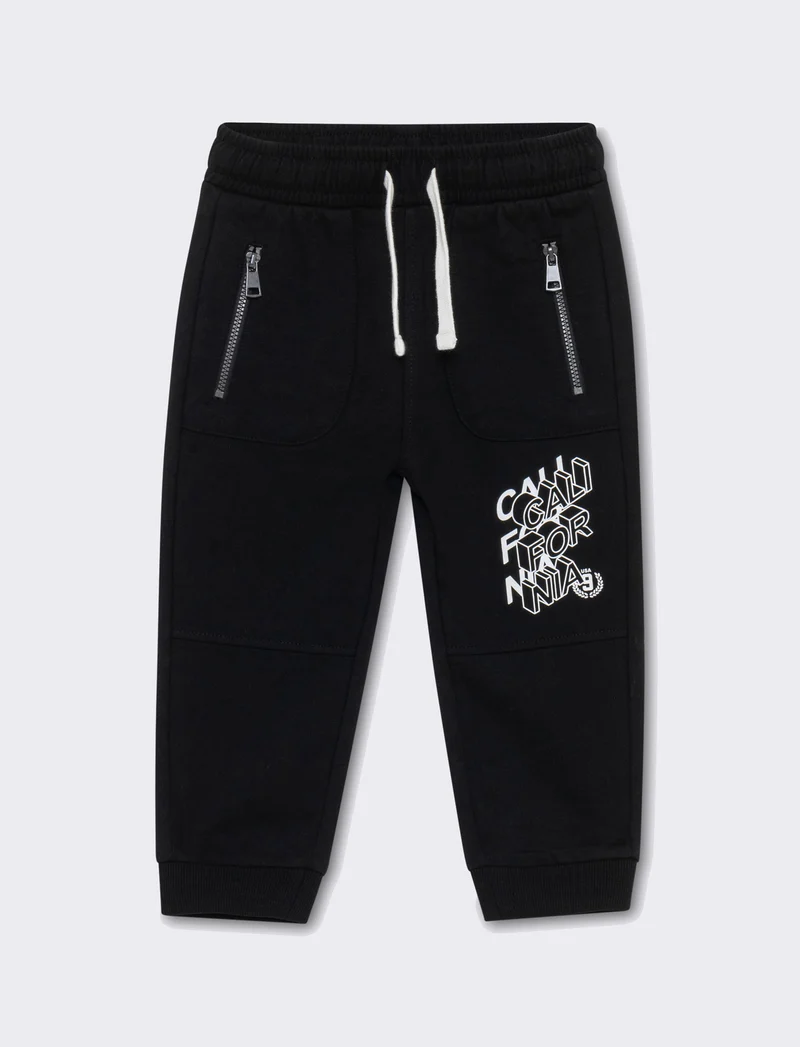 Jogger con zip da neonato - Nero