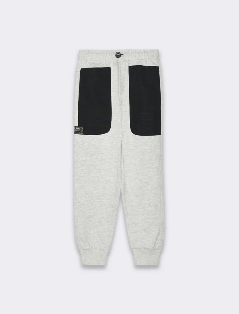 Jogger con tasconi da bambino - Grigio mel.