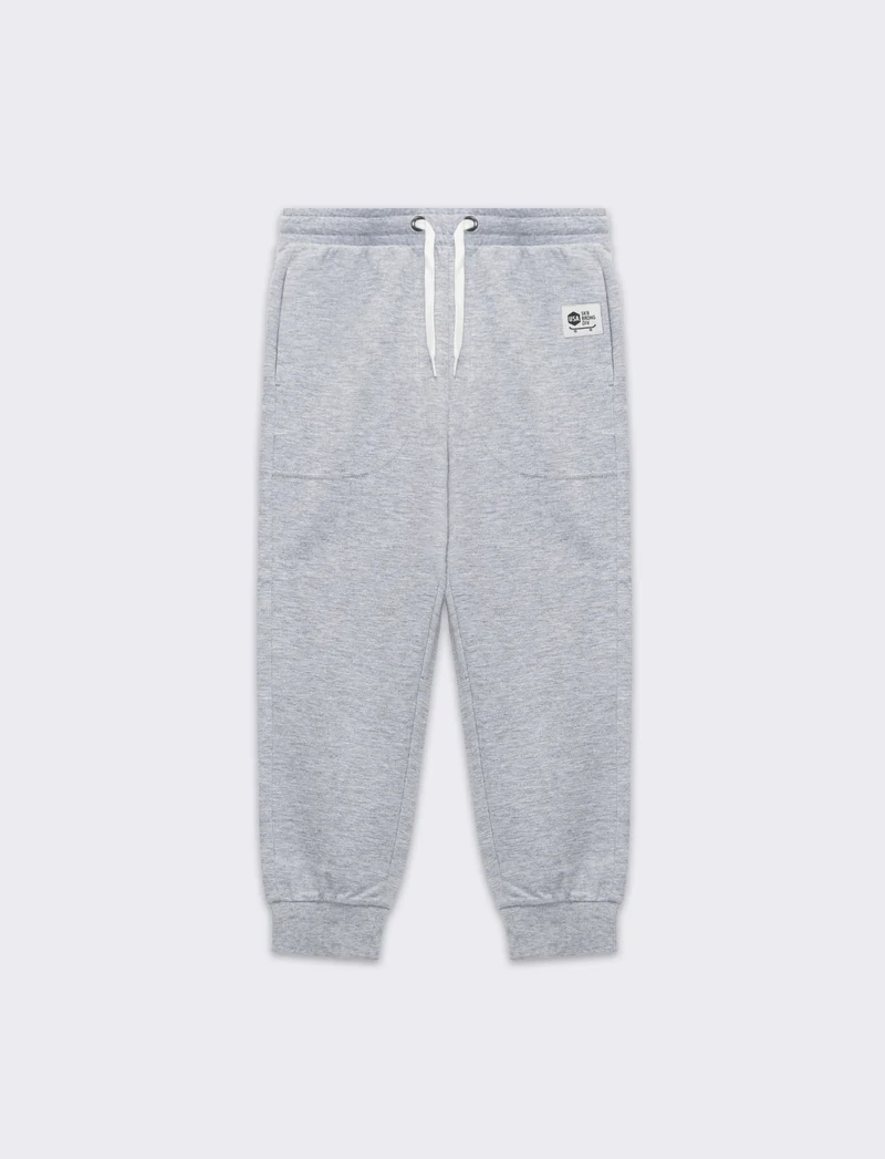 Pantaloni jogger da bambino - Grigio mel.