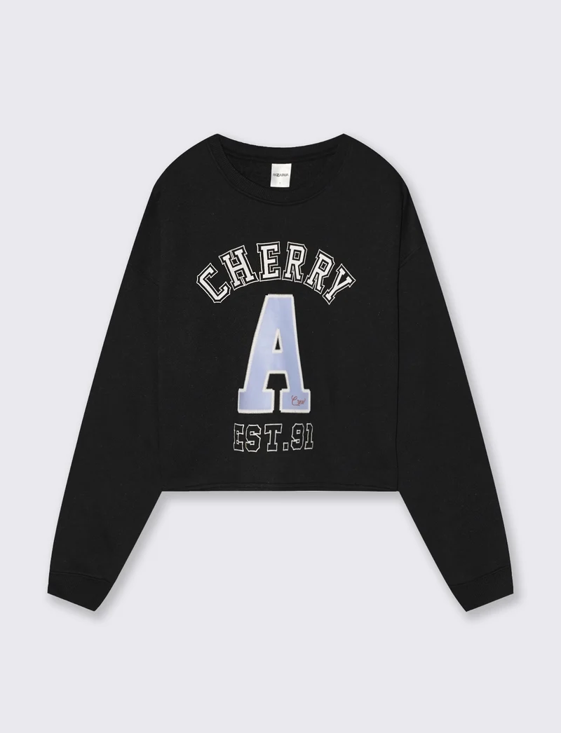 Felpa crop manica lunga con stampa - Nero