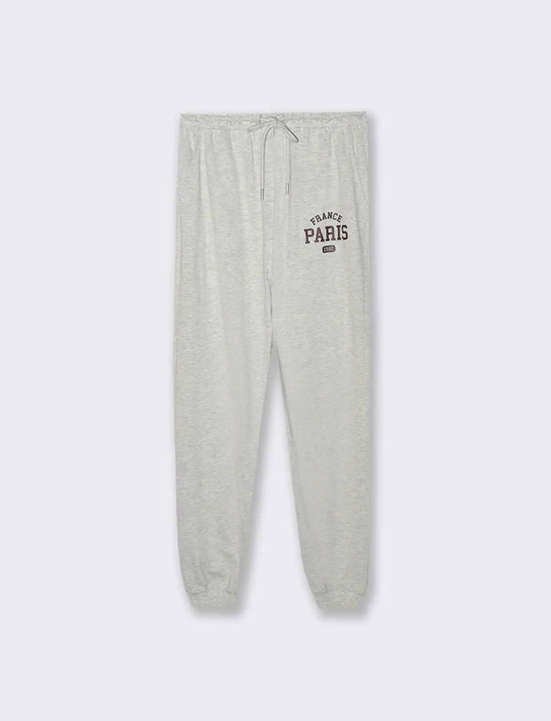 JOGGER CON STAMPA - Grigio chiaro mel.