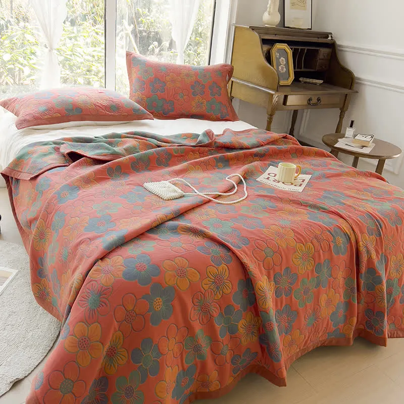 Trapunta reversibile in cotone jacquard con splendido motivo floreale