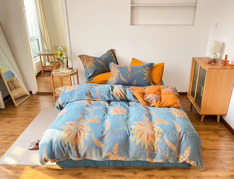 Set di biancheria da letto vintage in garza di cotone con motivo floreale.