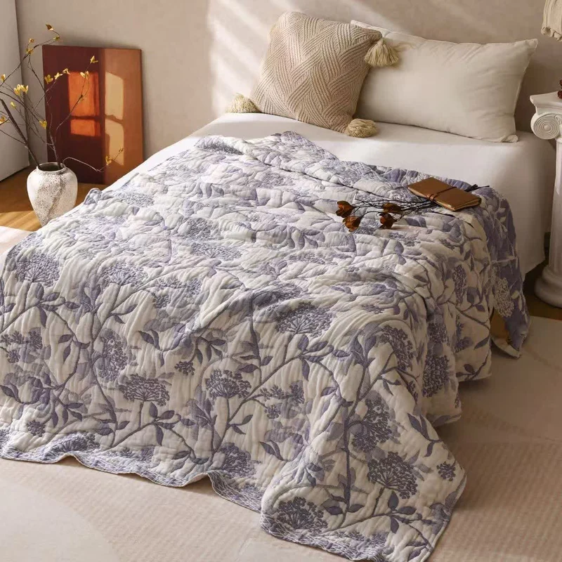 Trapunta vintage in garza di cotone jacquard con motivo floreale