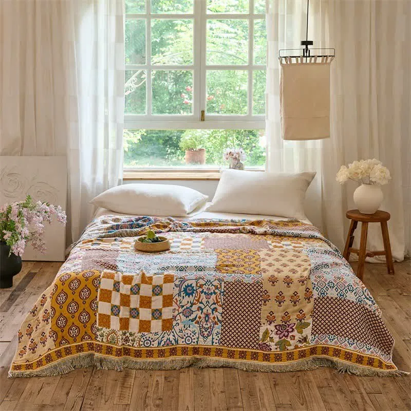 Coperta/trapunta reversibile in mussola stile boho patchwork