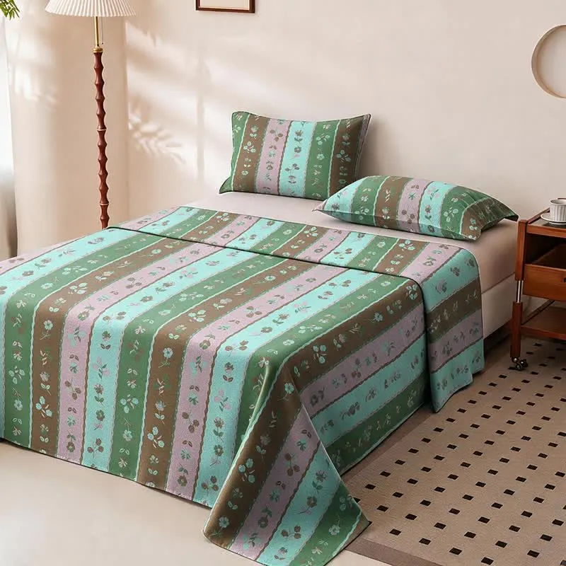Copriletto in cotone a righe multicolore con motivo floreale