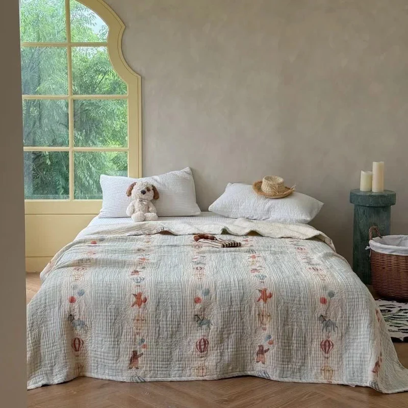 Trapunta leggera in cotone con simpatici animali da giardino