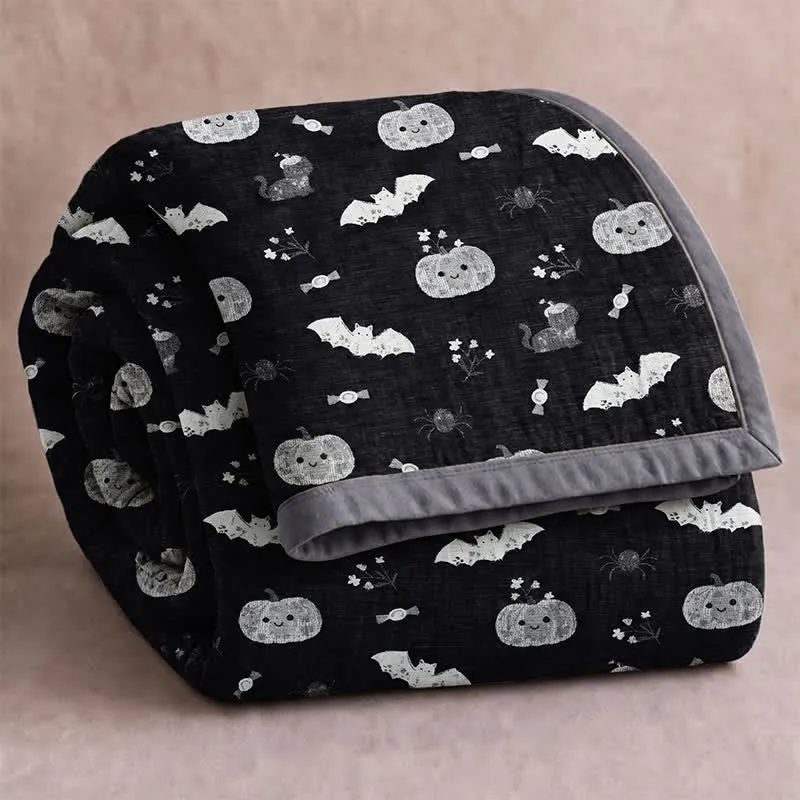 Simpatica coperta reversibile in cotone con motivo zucca e pipistrello di Halloween.