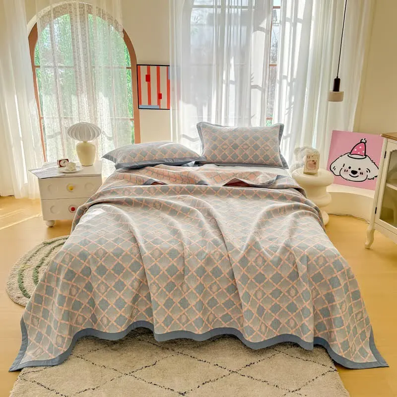 Trapunta reversibile in garza di cotone jacquard con motivo a reticolo
